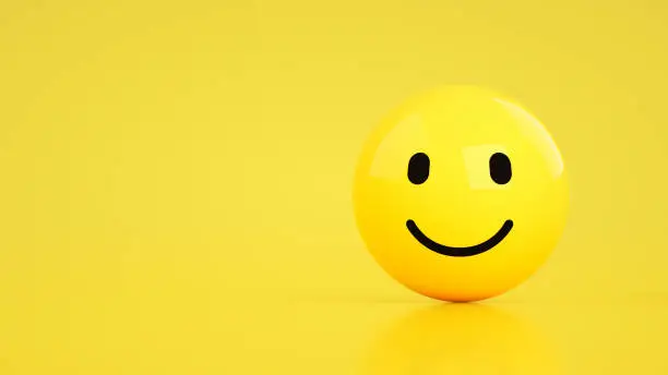 3d rendering of emoji with smiley face. yellow background. copy space.
