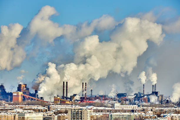 istock Poor environment in the city. Environmental disaster. Harmful emissions into the environment. Smoke and smog. Pollution of atmosphere by plant factory. Exhaust gases. 1208097993