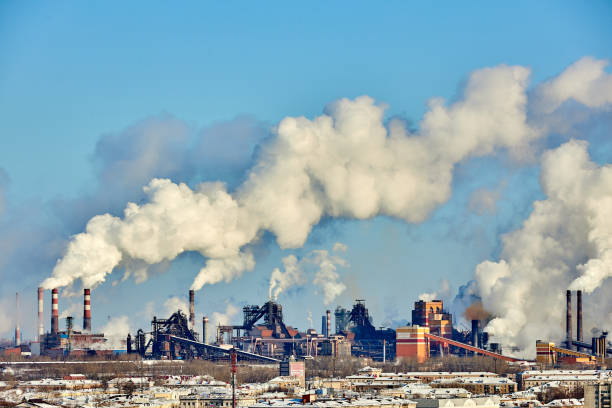 istock Poor environment in the city. Environmental disaster. Harmful emissions into the environment. Smoke and smog. Pollution of atmosphere by plant factory. Exhaust gases. 1208097994