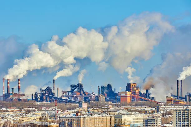 istock Poor environment in the city. Environmental disaster. Harmful emissions into the environment. Smoke and smog. Pollution of atmosphere by plant factory. Exhaust gases. 1208097995