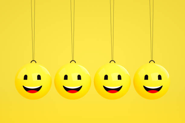 istock 3D Emoji with Happy Face on Newton's Cradle 1208098259