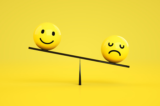 3D rendering of Emoji with Smiley and Sad Face on Balance Board, Seesaw Scale. Business Concept. Yellow background.