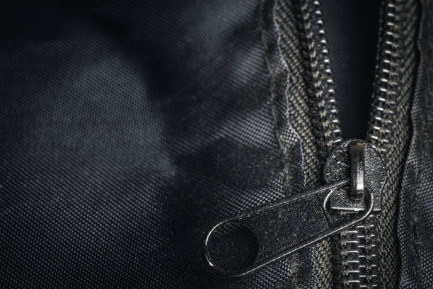 istock Closeup zipper on a black bag detail blur art object 1208101830