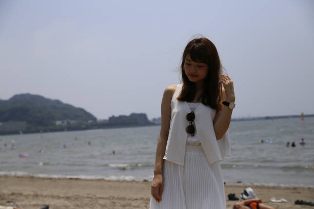 istock woman with a cute smile 1208102595