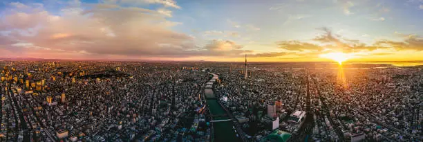 Asakusa district and skytree with dramatic sky at dawn in Tokyo, Japan