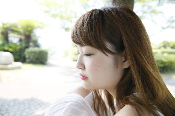 istock woman with a cute smile 1208109232