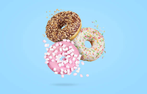 istock mix of multicolored sweet donuts with sprinkles 1208110165