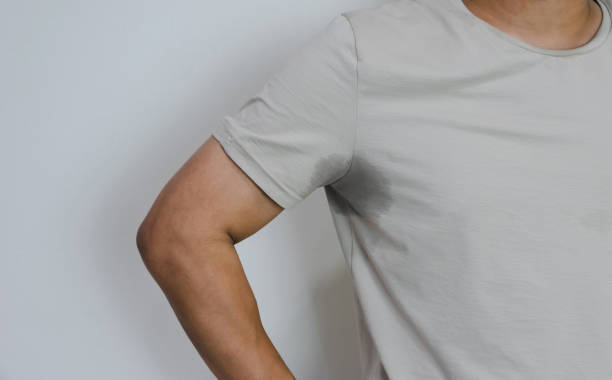 istock Men with sweating armpit and has a body odor 1208111582