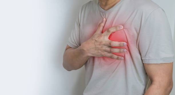 istock Hands holding chest with symptom heart attack disease 1208111587