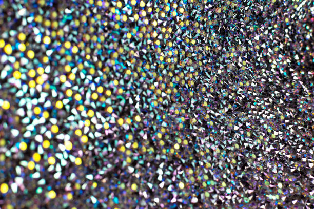 istock Bokeh light, flickering blur spots on a colorful abstract background. 1208112475