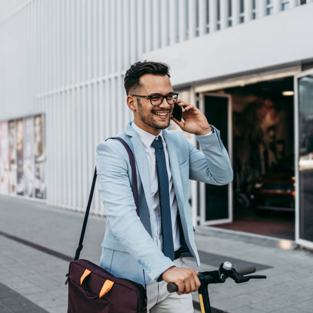 istock Modern man with electric scooter 1208114286