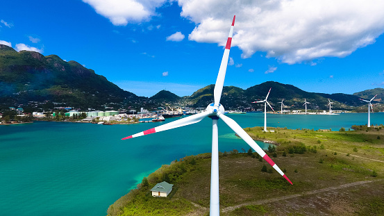 Wind turbines producing clean electricity in Victoria, Mahe Island, Seychelles.