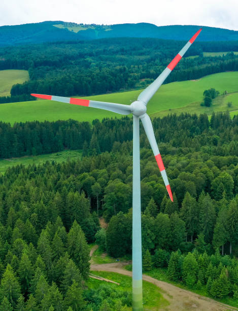 istock Renewable energy, Wind turbine view from drone,black forest germany 1208116576