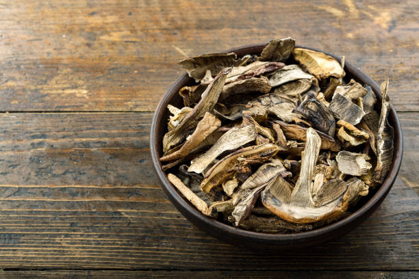 istock Dried mushrooms boletus sliced, on a plate 1208121340
