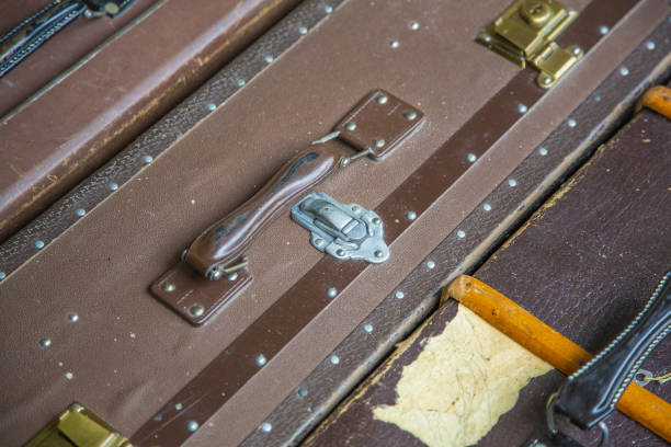 istock Old bulky brown retro suitcase 1208126626
