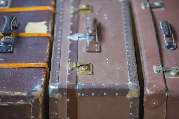 istock Old bulky brown retro suitcase 1208126639