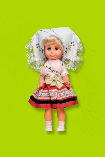 istock a simple abstract toy doll isolated on the color background with copy space, float in air 1208133032