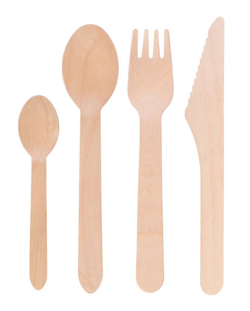 istock Disposable wooden cutlery isolated on white 1208133150