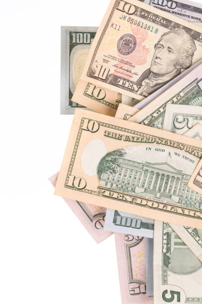 istock Dollar bills are located in chaos. 1208135763