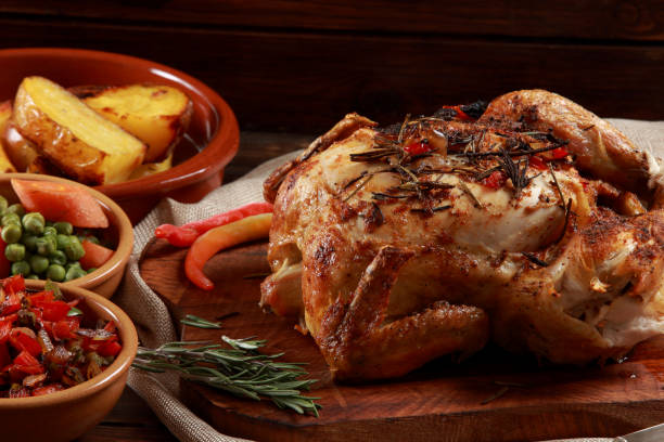 istock Roast Chicken surrounded by Vegetables ready to eat 1208137163