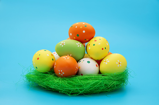 Easter eggs isolated on blue background