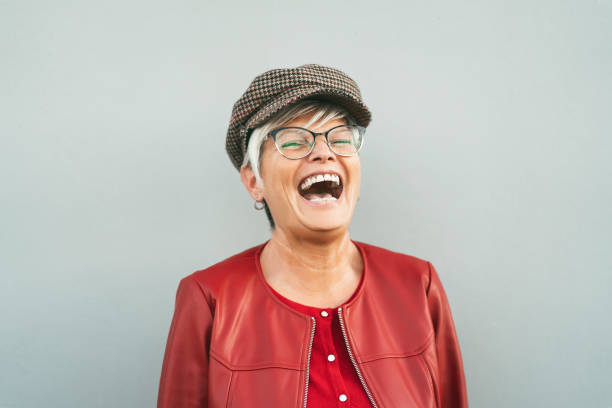 happy senior woman laughing outdoor - trendy mature person having fun during retired time - elderly people lifestyle concept - funky people cool women imagens e fotografias de stock