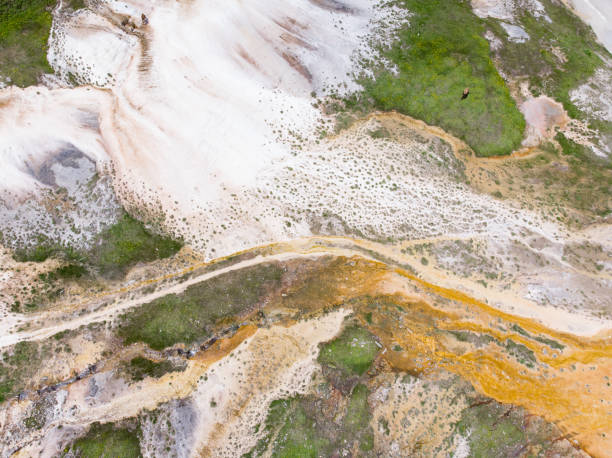 istock High Angle View Of Minerals On Water Flowing Through Rocks And Grass 1208143186