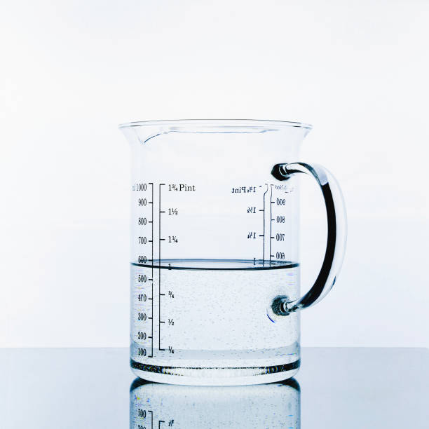 istock One pint of clean water in a glass container on a light background 1208151168