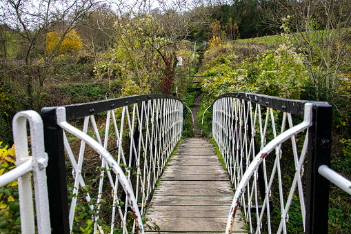 View across the Jubilee Footbridge over the Thames and Severn Canal at Thrupp, Stroud, Gloucestershire