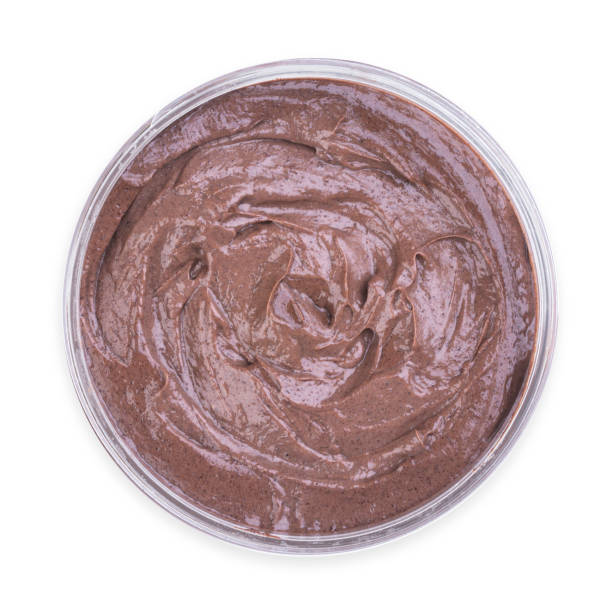 istock Jar of chocolate cream isolated on white background, top view 1208156092