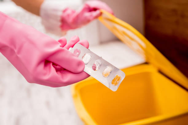 istock Young girl sorting garbage at the kitchen. Concept of recycling. Zero waste 1208157837