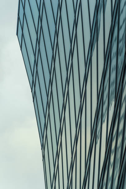 istock Modern architecture, fragment of a building, glass facade. 1208163244