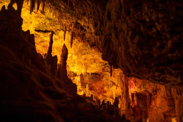 istock Formations of stalactites and stalagmites in a cave. Mallorca, Spain 1208163331
