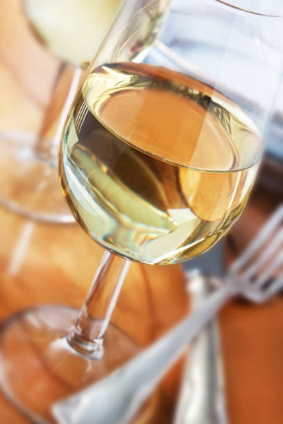 istock White wine glasses and cutlery 1208163611