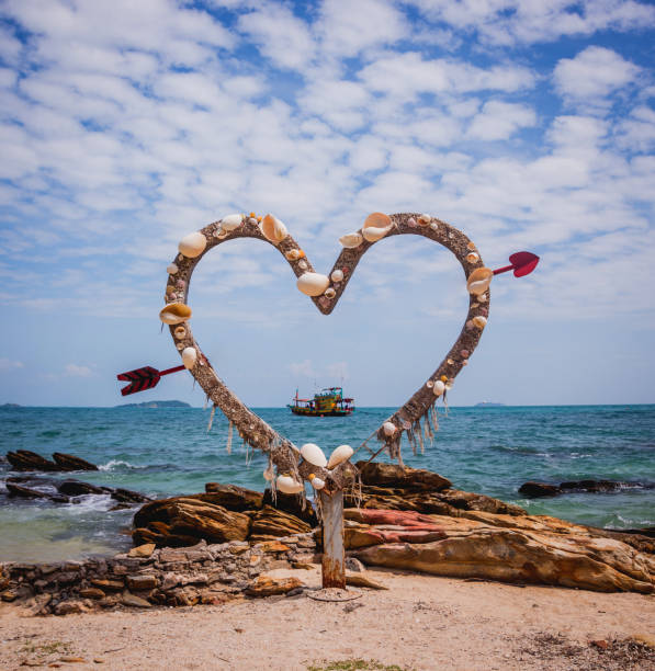 istock Holiday decoration. Seashells heart. Summer beach concept. 1208165726