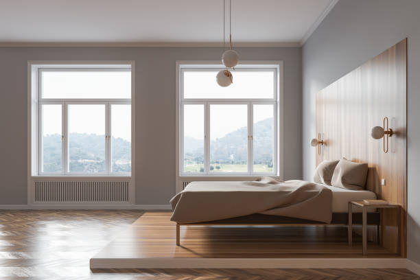 istock Gray and wooden master bedroom, side view 1208165810