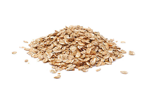 istock Dried oatmeal in a pile isolated on a white background 120816626