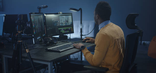 istock Wheelchaired film editor working on a movie 1208167270