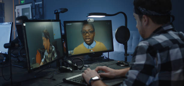 istock Digital artists discussing an animated film 1208167394