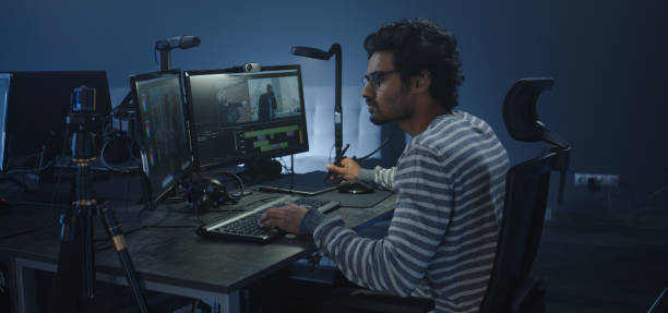 istock Film editor working on a movie 1208167395