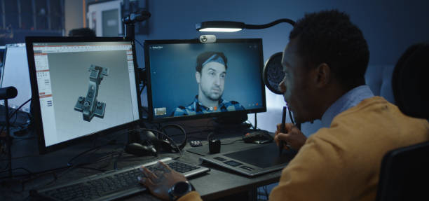 istock Graphic designers discussing via a video call 1208167428