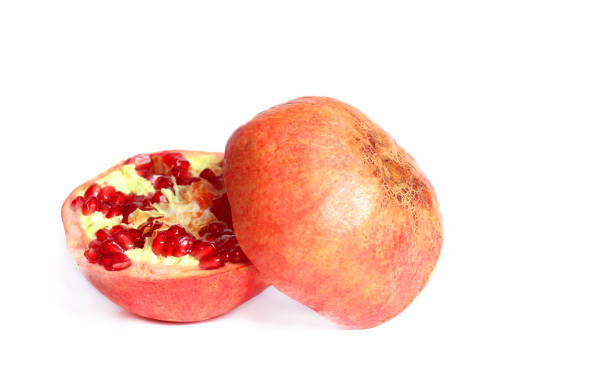 istock Ripe pomegranate fruit on white background cutout 1208167461