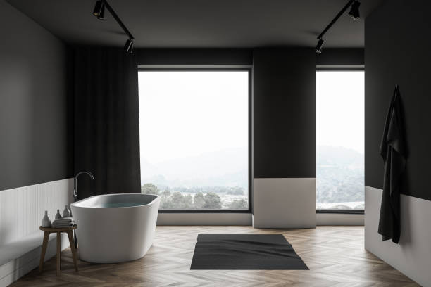 istock Gray and white loft bathroom with tub, side view 1208168179