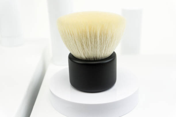 istock face powder and kabuki face brush 1208168609
