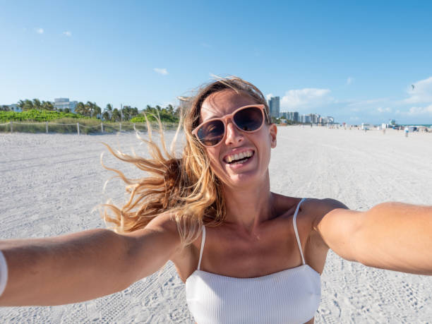 istock Selfie woman Miami Beach 1208169313
