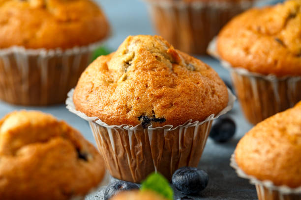 istock Blueberries muffins, cupcake with mint and berry 1208171270