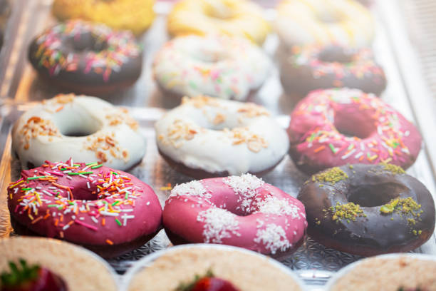 istock Various fresh pastries and desserts are on display in a bakery shop 1208171528