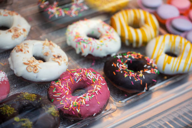 istock Various fresh pastries and desserts are on display in a bakery shop 1208171537