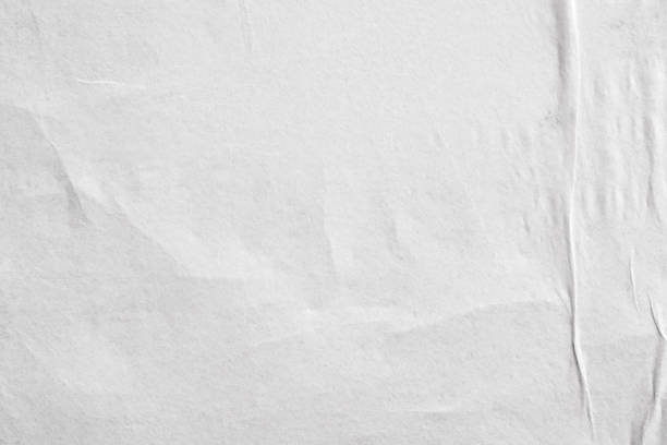 istock Blank white crumpled and creased paper poster texture background 1208171706