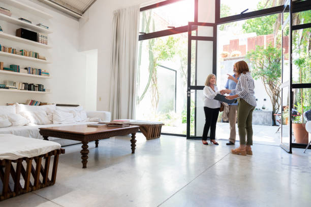 istock Showing the house, real estate agent 1208173269